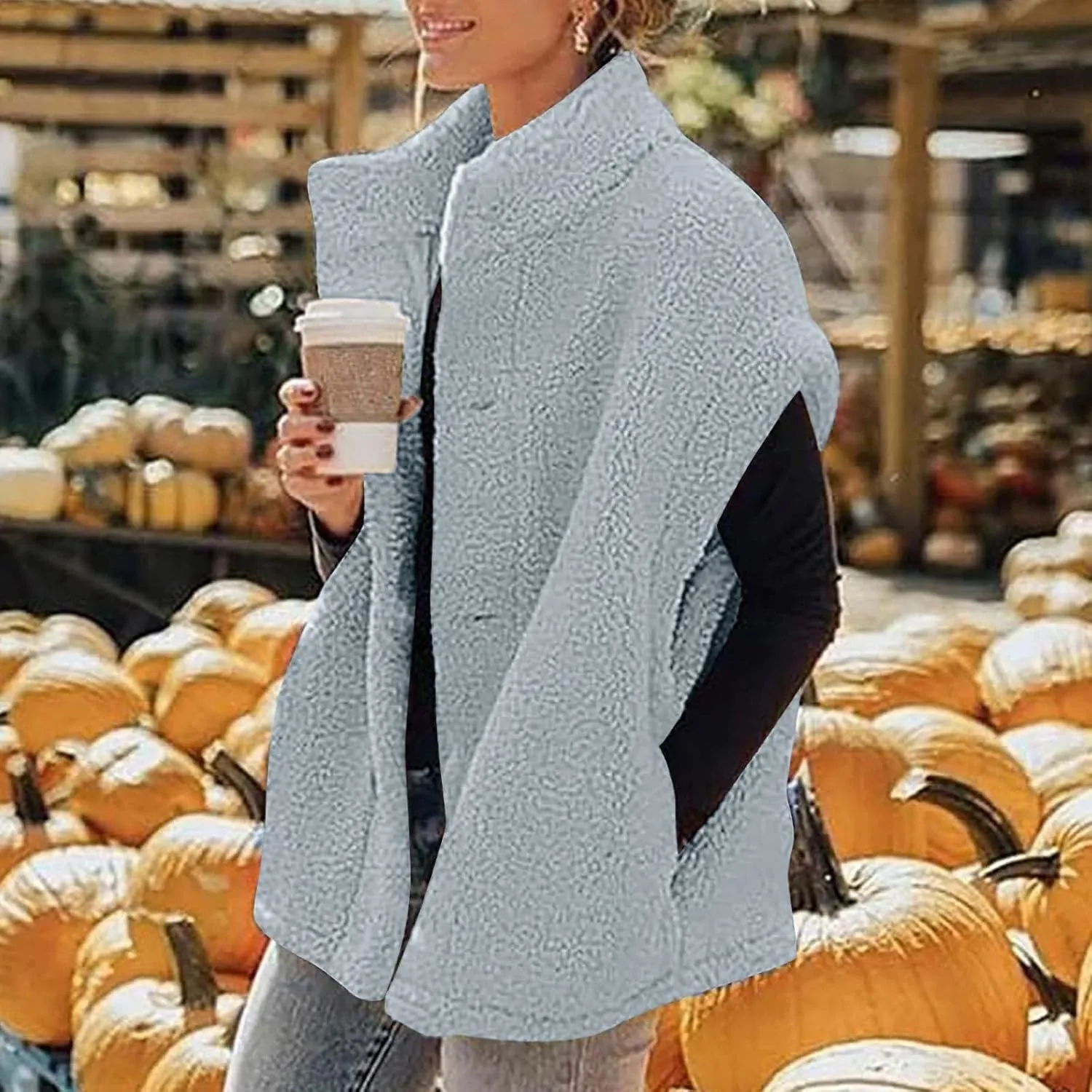 YRAETENM Women's Fuzzy Fleece Vest Casual Oversized Warm Button down Gilet Soft Sleeveless Stand Collar Jackets with Pockets